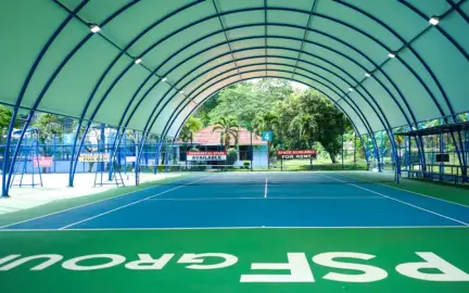 Arched roof over the semi-indoor tennis court